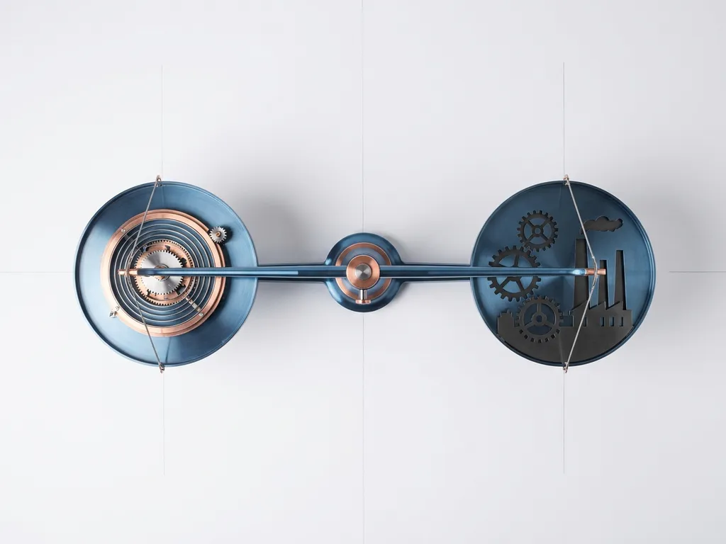Balanced scale with metallic spring mechanism on one side and abstract factory silhouettes on the other, overhead view on white grid background